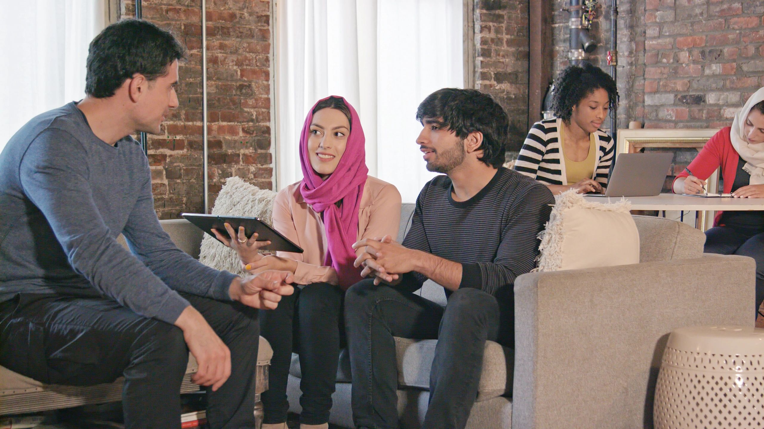 Women in a collaborative professional setting